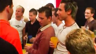 A group of males in a party turns into a bunch of guys stripping and showing off their peckers