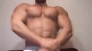 Watch this body builder flex his huge muscles  at EveryDayPorn.co 
