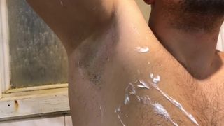 Guy Shaves his Armpits in the Bathroom