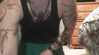 Tattooed guy strokes hard rock cock to climax Sugar Shane