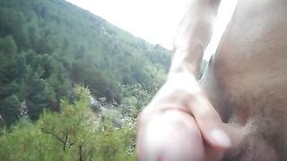 Wank with a view. Masturbation on a mountain. Touching my slim, oiled body outdoors. Curved-dick