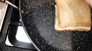 Growing gainer shows you how to make an EPIC grilled⁄fried cheese¡ EvilTwinks