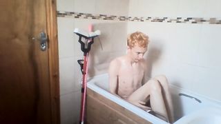 sexy skinny blonde teen takes a bath and wets his hair and cock Peter bony
