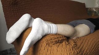 A Guy makes a Foot Massage to a Guy in Socks - ARTEM SUCHKOV ARTEM SUCHKOV